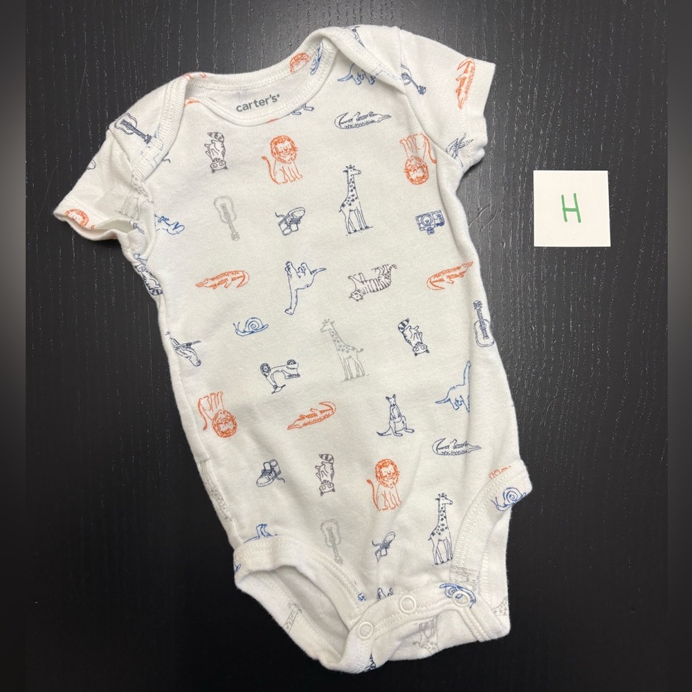 ⭐️5/$10.00⭐️—Carter's 3m (0-3m) White Bodysuit with Blue and Orange Animal Print